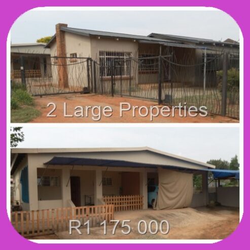 2 LARGE HOUSES ON ONE STAND WITH LOTS OF POTENTIAL FOR RENTAL INCOME