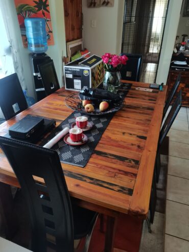 Wooden dining table with 6 chairs, side board and 3 cubbourts